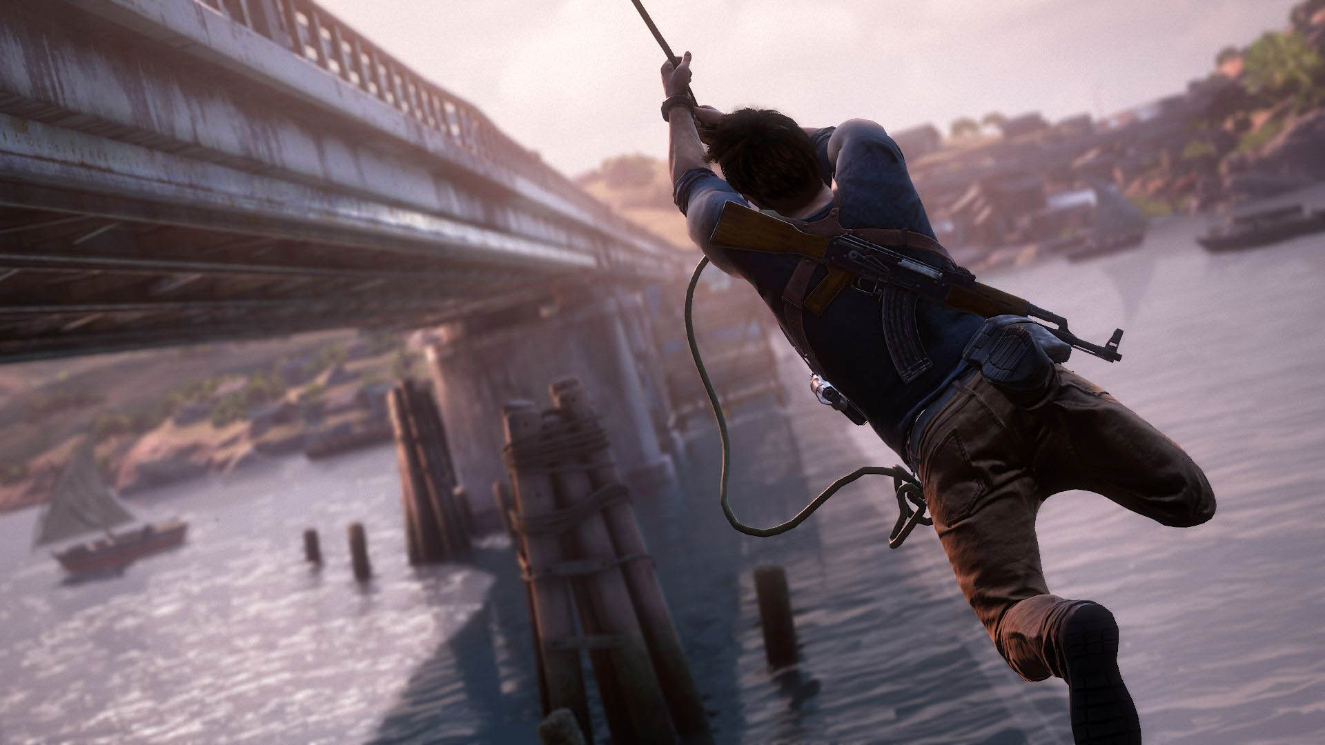 uncharted-4-a-thief-s-end-tarzan-jump-next-to-a-bridge-wallpaper-5742